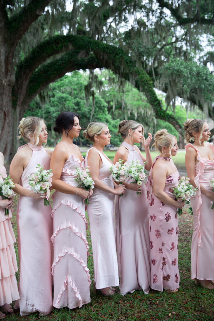 wedding day ceremony bridesmaids in pink at middleton place